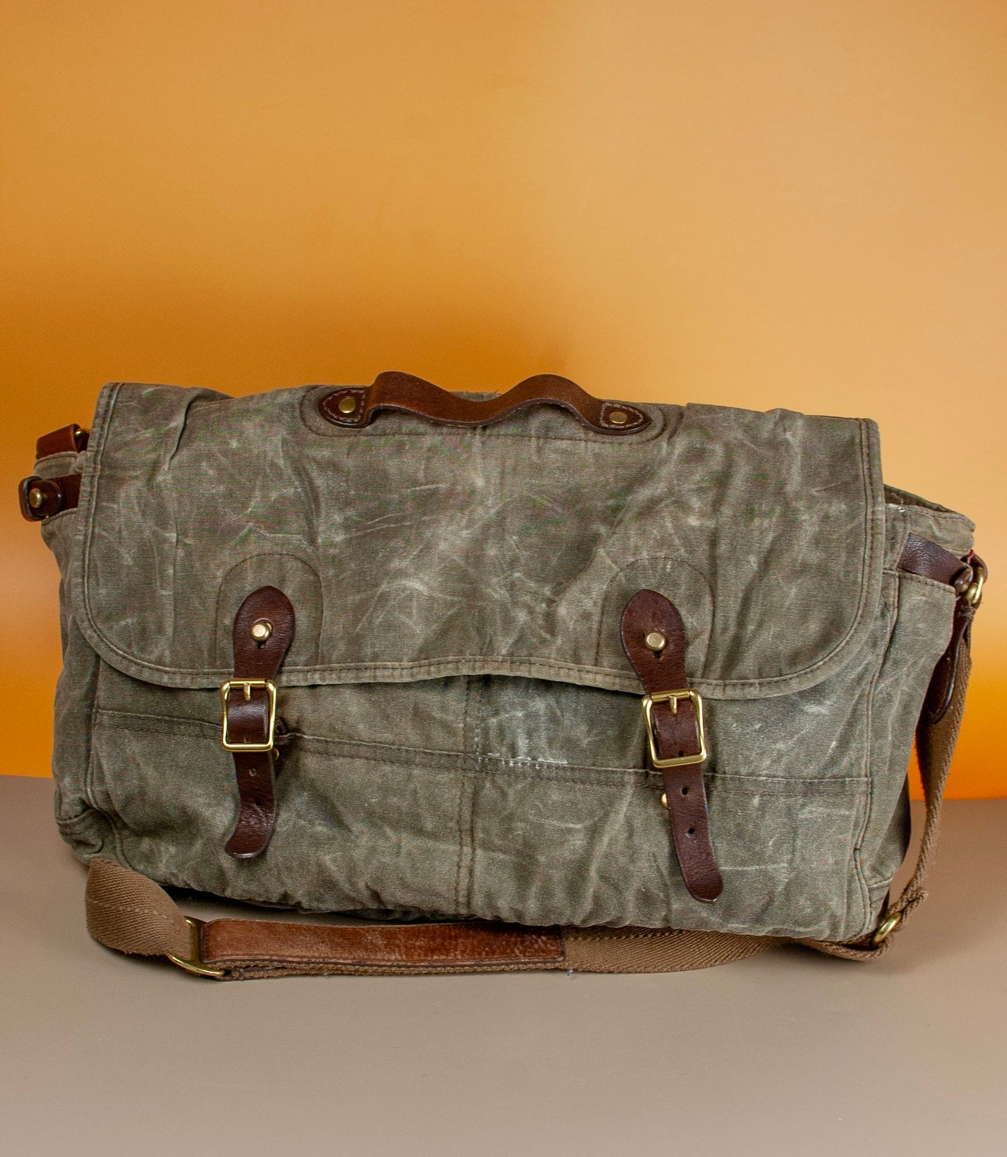 Secondhand waxed canvas & leather bag by J. Crew in very good condition.