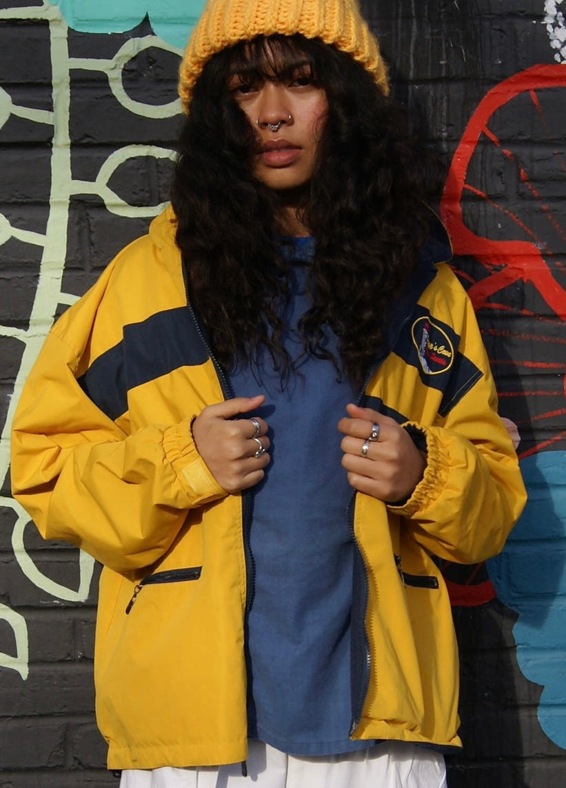 A vintage insulated yellow windbreaker designed for serious boating.