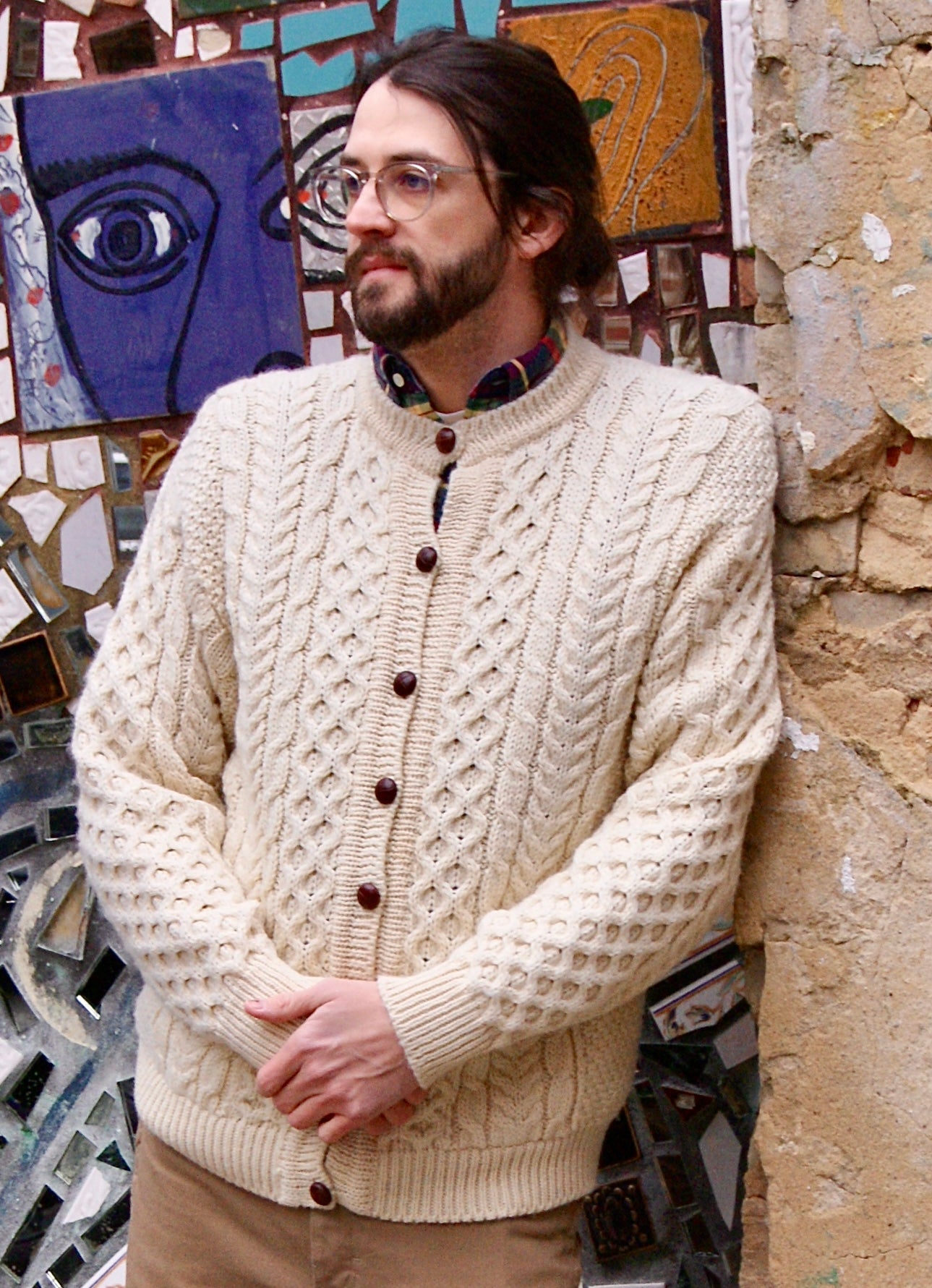 off-white cable-knit cardigan wool sweater with traditional wood-style buttons