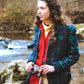Female model wears a vibrant & classy navy-green-red plaid wool blazer from Pendleton in excellent condition