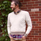 pure white cable-knit v-neck sweater with gold & tan stripe details