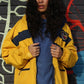 A vintage insulated yellow windbreaker designed for serious boating. 