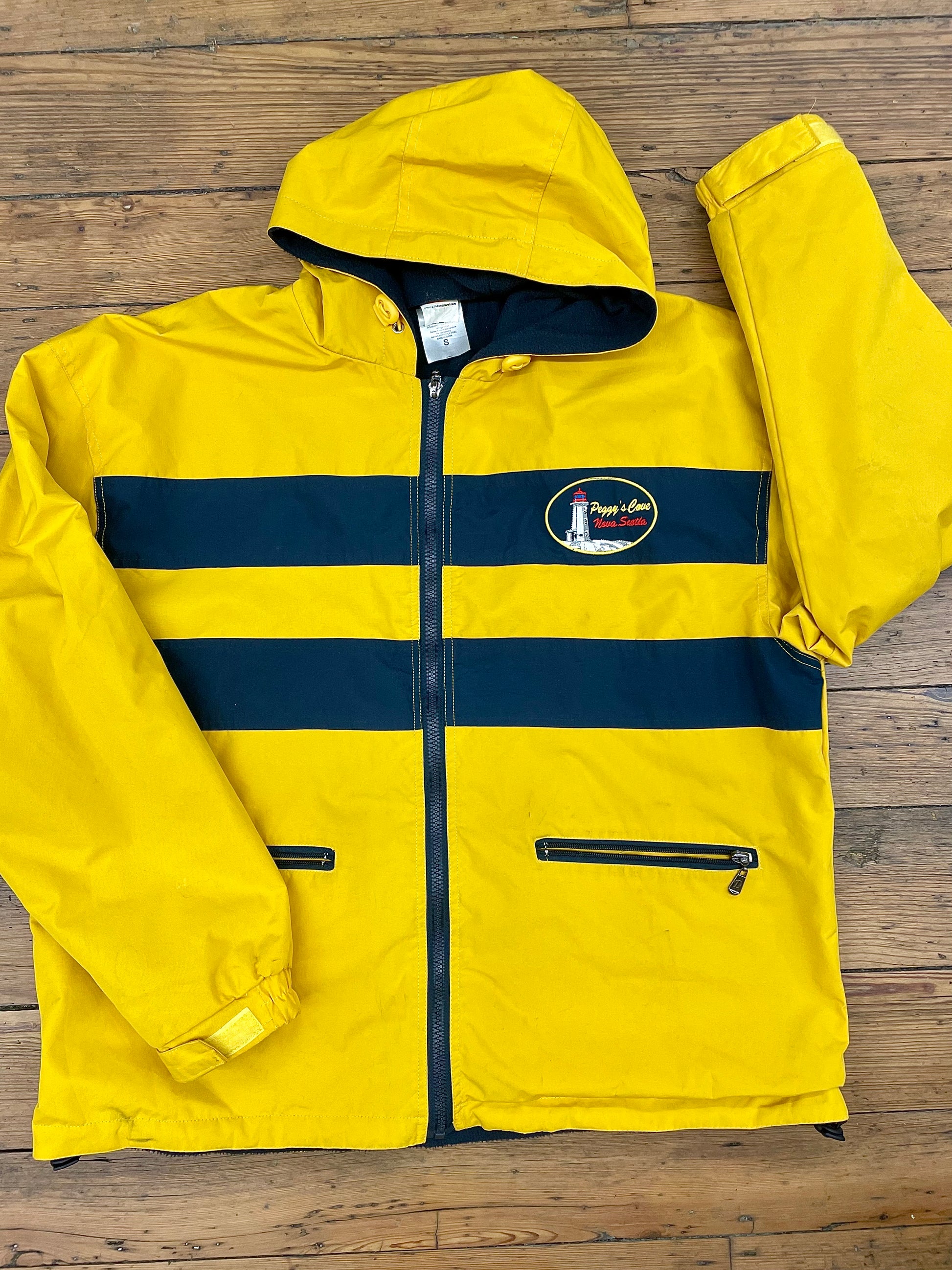 A vintage insulated yellow windbreaker designed for serious boating. 