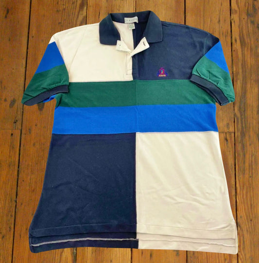 golf-style polo shirt with green, navy, white & blue color block panels & two center stripes 