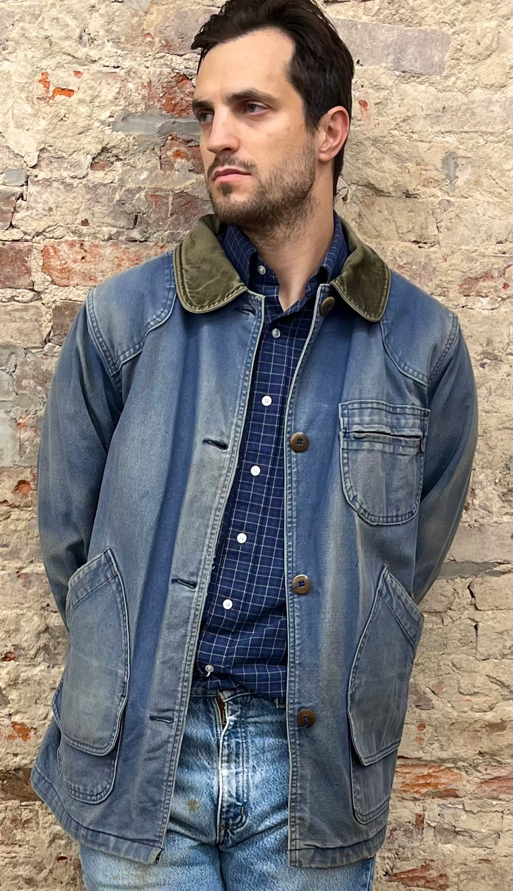 Model wearing the faded classic barn jacket from LL Bean, 80s/90s era.