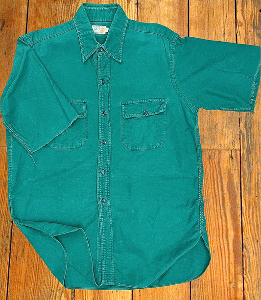 LL Bean 1960s-era green chamois shirt with sleeves that were cut off into short-sleeve