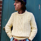 Male model wears off-white vintage cotton cable knit sweater